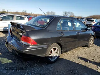 2002 Mitsubishi Lancer OZ-Rally with VIN JA3AJ86E42U083493, listed as a Copart auction lot 86426834 with 158,136 mi miles and Clean Title. Bid and sale history available at carsss.com. Image 3.