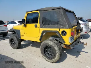 2003 Jeep Wrangler Sport with VIN 1J4FA49S43P369906, listed as a Copart auction lot 58079235 with 139,547 mi miles and Salvage title. Bid and sale history available at DreamBid. Image 2.