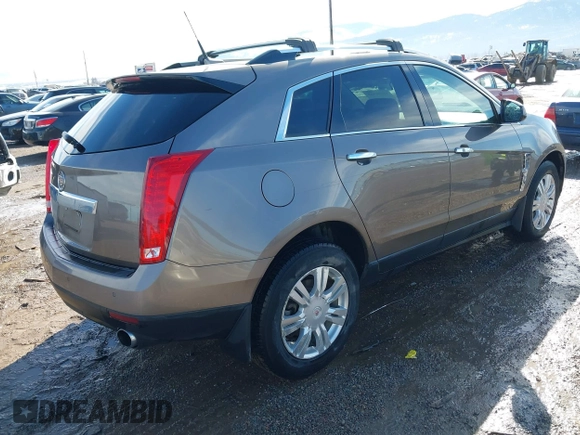 2011 Cadillac SRX Luxury Collection with VIN 3GYFNDEY6BS573962, listed as a IAAI auction lot 41656965 with 155,775 mi miles. Bid and sale history available at carsss.com. Image 4.