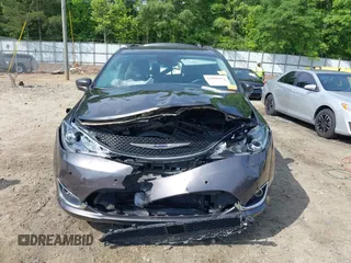 2020 Chrysler Pacifica Touring L Plus z VIN 2C4RC1EG5LR203664, wystawiony jako IAAI lot #42088493 z przebiegiem 104 745 mil mil oraz . Historia ofert i sprzedaży dostępna na DreamBid. Obrazek 12.