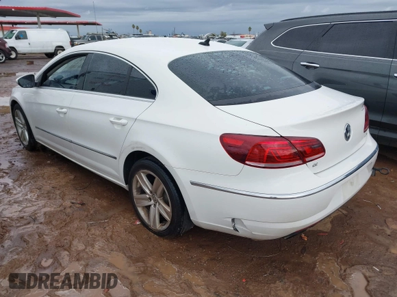 2013 Volkswagen CC Sport Plus z VIN WVWBP7AN3DE507295, wystawiony jako IAAI lot #41753980 z przebiegiem 113 250 mil mil oraz . Historia ofert i sprzedaży dostępna na DreamBid. Obrazek 3.
