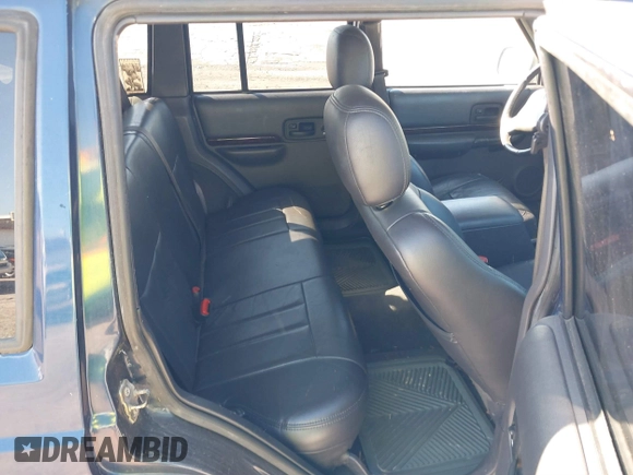 2001 Jeep Cherokee Sport with VIN 1J4FF58S21L612724, listed as a IAAI auction lot 41668763 with 122,464 mi miles and . Bid and sale history available at DreamBid. Image 8.