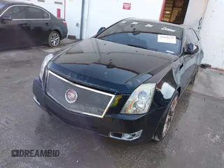 2011 Cadillac CTS Performance z VIN 1G6DJ1ED7B0135191, wystawiony jako IAAI lot #41660128 z przebiegiem 121 567 mil mil oraz . Historia ofert i sprzedaży dostępna na DreamBid. Obrazek 6.