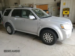 2008 Mercury Mariner Premier z VIN 4M2CU87108KJ13679, wystawiony jako Copart lot #56635785 z przebiegiem 166 732 mil mil oraz Szkody całkowita. Historia ofert i sprzedaży dostępna na DreamBid. Obrazek 4.