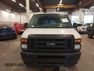 2011 Ford Econoline Cargo Commercial with VIN 1FTNE1EW5BDB01167, listed as a IAAI auction lot 41226859 with 248,606 mi miles and . Bid and sale history available at DreamBid. Image 12.