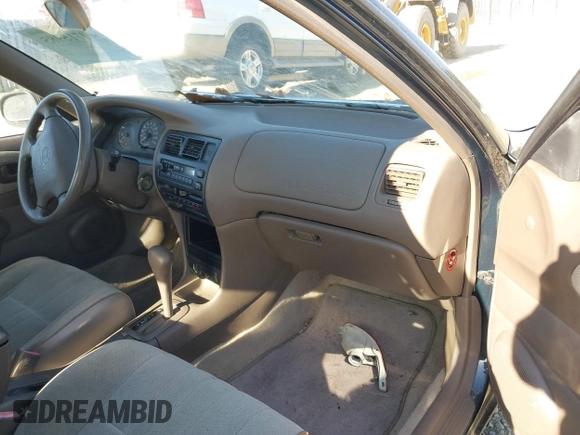1997 Toyota Corolla with VIN 2T1BA02E0VC162383, listed as a IAAI auction lot 40715985 with 141,713 mi miles and . Bid and sale history available at DreamBid. Image 5.
