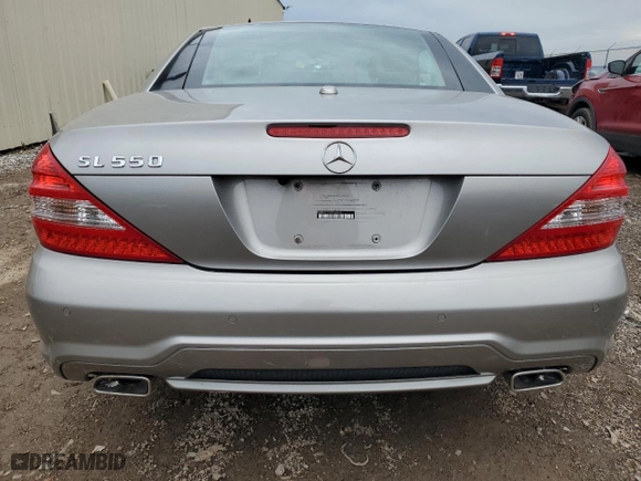 2009 Mercedes-Benz SL-Class V8 with VIN WDBSK71F49F143492, listed as a Copart auction lot 88757425 with 89,117 mi miles and Salvage Title. Bid and sale history available at carsss.com. Image 6.