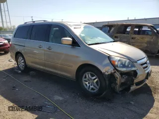 2006 Honda Odyssey EX-L z VIN 5FNRL38726B425098, wystawiony jako Copart lot #56143585 z przebiegiem 153 137 mil mil oraz Szkoda całkowita • Salvage title. Historia ofert i sprzedaży dostępna na DreamBid. Obrazek 4.