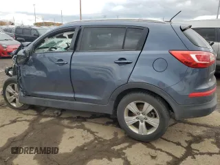 2012 Kia Sportage LX z VIN KNDPBCA28C7206947, wystawiony jako Copart lot #74242323 z przebiegiem Nie podano mil oraz Szkoda całkowita • Salvage title. Historia ofert i sprzedaży dostępna na DreamBid. Obrazek 2.