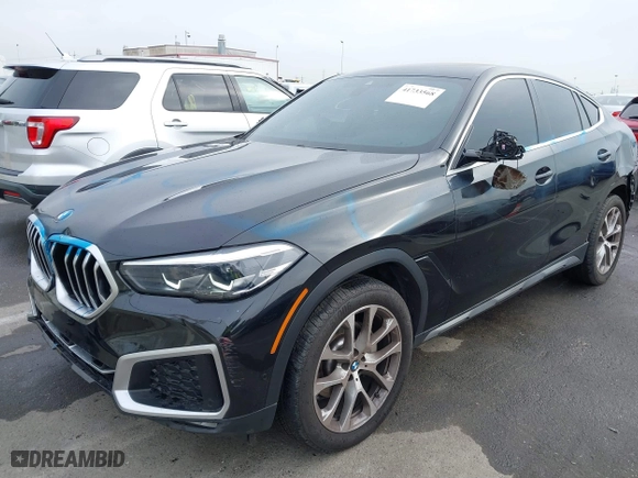 2021 BMW X6 xDrive40i with VIN 5UXCY6C08M9G88854, listed as a IAAI auction lot 41733568 with 30,150 mi miles. Bid and sale history available at carsss.com. Image 6.