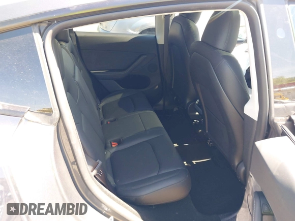 2023 Tesla Model Y Long Range z VIN 7SAYGDEE8PA191415, wystawiony jako IAAI lot #42155577 z przebiegiem 42 149 mil mil oraz . Historia ofert i sprzedaży dostępna na DreamBid. Obrazek 8.