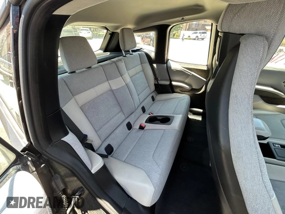 2014 BMW i3 with VIN WBY1Z4C51EV274633, listed as a Copart auction lot 64677185 with 61,664 mi miles and Clean title. Bid and sale history available at DreamBid. Image 6.