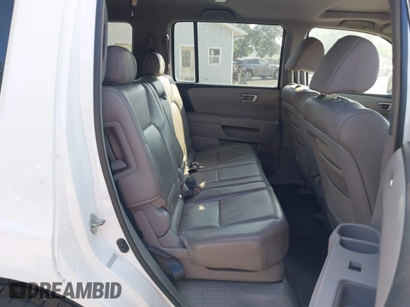 2009 Honda Pilot EX-L with VIN 5FNYF48569B039103, listed as a IAAI auction lot 42651867 with 162,450 mi miles and . Bid and sale history available at DreamBid. Image 8.