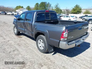 2015 Toyota Tacoma with VIN 3TMLU4EN0FM194841, listed as a IAAI auction lot 41860349 with 200,005 mi miles and . Bid and sale history available at DreamBid. Image 3.