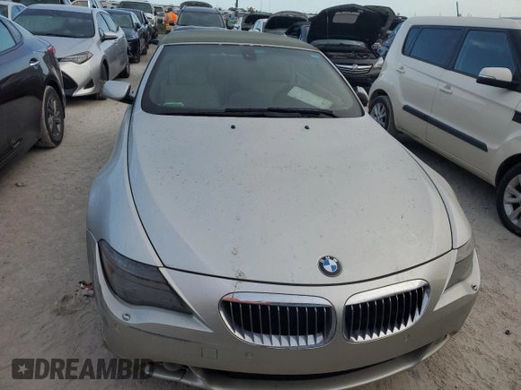 2006 BMW 6 Series 650Ci z VIN WBAEK13466CN72361, wystawiony jako Copart lot #74586414 z przebiegiem Nie podano mil oraz Szkoda całkowita • Salvage title. Historia ofert i sprzedaży dostępna na DreamBid. Obrazek 5.