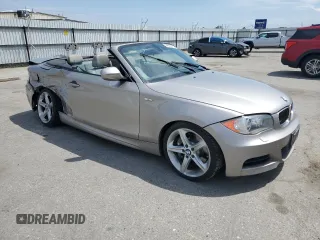 2010 BMW 1 Series 135i with VIN WBAUN9C55AVK41973, listed as a Copart auction lot 54609015 with 144,685 mi miles and Salvage Title. Bid and sale history available at carsss.com. Image 4.