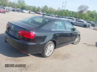 2013 Volkswagen Jetta TDI w/Premium with VIN 3VWLL7AJ5DM390579, listed as a IAAI auction lot 42112031 with 134,995 mi miles and . Bid and sale history available at DreamBid. Image 4.