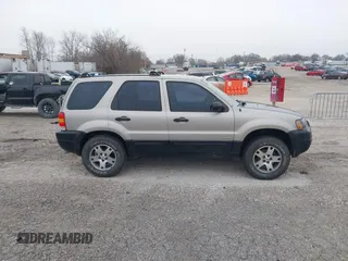 2001 Ford Escape with VIN 1FMUU01B61KE00524, listed as a IAAI auction lot 41486950 with 163,753 mi miles and . Bid and sale history available at DreamBid. Image 13.