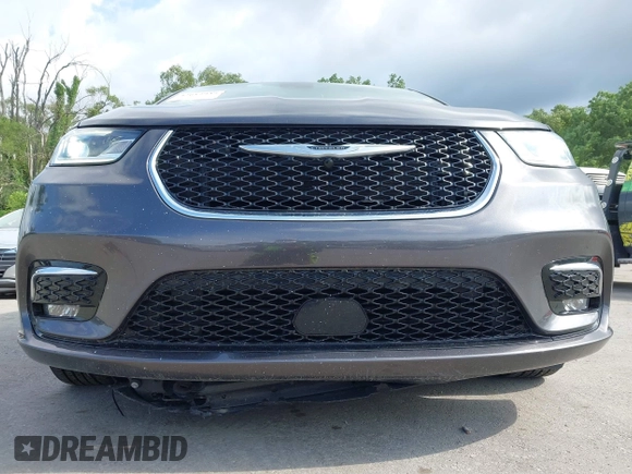 2023 Chrysler Pacifica Touring L with VIN 2C4RC1BG6PR612749, listed as a IAAI auction lot 42612932 with 69,931 mi miles and . Bid and sale history available at DreamBid. Image 6.