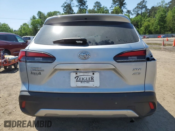 2022 Toyota Corolla Cross XLE с VIN 7MUDAABGXNV006090, выставлен на аукционе Copart как лот 52609245 с пробегом 84 505 миль миль и Списание • Salvage title. История ставок и продаж доступна на DreamBid. Изображение 6.