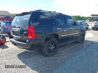 2011 GMC Yukon SLT z VIN 1GKS2CE02BR345370, wystawiony jako IAAI lot #42338653 z przebiegiem 225 000 mil mil oraz . Historia ofert i sprzedaży dostępna na DreamBid. Obrazek 4.