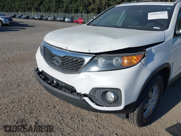 2013 Kia Sorento LX with VIN 5XYKT3A60DG349289, listed as a IAAI auction lot 42063515 with 138,676 mi miles and . Bid and sale history available at carsss.com. Image 6.