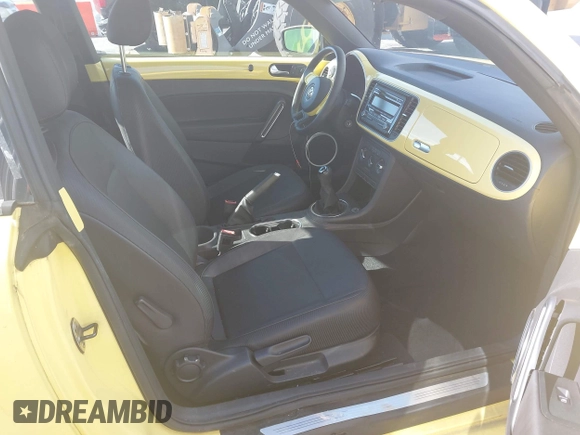 2013 Volkswagen Beetle 2.5L with VIN 3VWHX7AT7DM613197, listed as a IAAI auction lot 41298890 with 130,219 mi miles and . Bid and sale history available at DreamBid. Image 5.