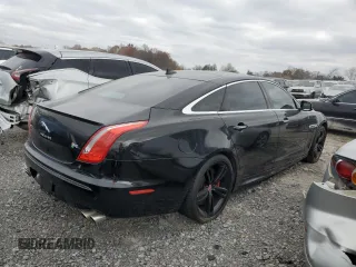2014 Jaguar XJ with VIN SAJWA2EKXEMV64494, listed as a Copart auction lot 82634004 with 119,811 mi miles and Clean title. Bid and sale history available at DreamBid. Image 3.