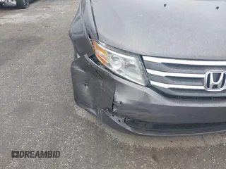 2011 Honda Odyssey EX-L with VIN 5FNRL5H64BB029087, listed as a IAAI auction lot 42508764 with 214,705 mi miles and . Bid and sale history available at DreamBid. Image 6.
