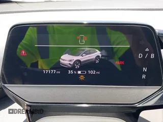 2023 Volkswagen ID.4 Pro S z VIN 1V2GNPE80PC006590, wystawiony jako IAAI lot #42178241 z przebiegiem 17 177 mil mil oraz . Historia ofert i sprzedaży dostępna na DreamBid. Obrazek 7.
