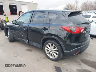 2013 Mazda CX-5 Grand Touring with VIN JM3KE4DEXD0154638, listed as a IAAI auction lot 41528944 with 195,159 mi miles. Bid and sale history available at carsss.com. Image 3.