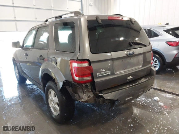 2010 Ford Escape XLT with VIN 1FMCU0D75AKA12803, listed as a IAAI auction lot 41339117 with 175,580 mi miles. Bid and sale history available at carsss.com. Image 6.