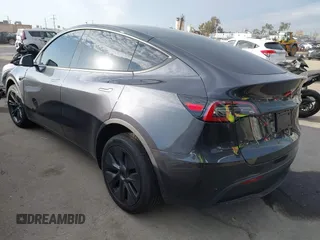 2025 Tesla Model Y Long Range with VIN 7SAYGDED6SF229498, listed as a IAAI auction lot 41086718 with 509 mi miles and . Bid and sale history available at DreamBid. Image 3.