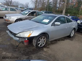 2003 Honda Accord Cpe EX with VIN 1HGCM82653A007091, listed as a IAAI auction lot 40997964 with 213,818 mi miles. Bid and sale history available at carsss.com. Image 18.