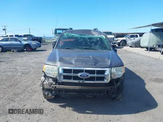 2011 Ford Escape XLT with VIN 1FMCU0D79BKB79697, listed as a IAAI auction lot 41265677 with 138,026 mi miles. Bid and sale history available at carsss.com. Image 6.