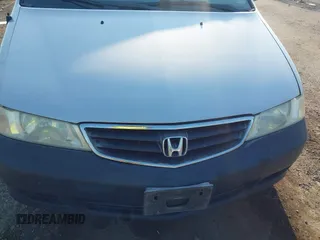 2004 Honda Odyssey LX with VIN 5FNRL18534B007617, listed as a IAAI auction lot 42687524 with 220,079 mi miles and . Bid and sale history available at DreamBid. Image 6.