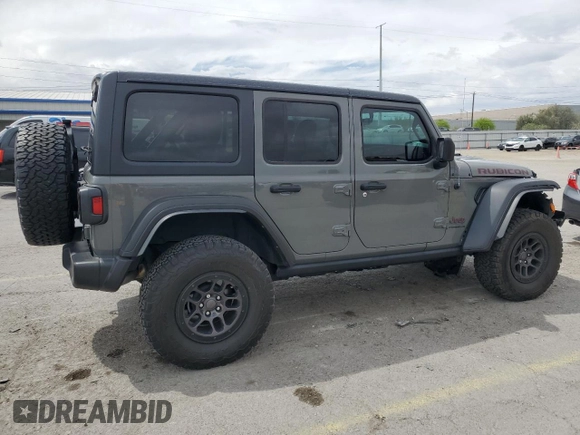 2023 Jeep Wrangler Rubicon with VIN 1C4JJXFG4PW523432, listed as a Copart auction lot 51642975 with 23,631 mi miles and Salvage title. Bid and sale history available at DreamBid. Image 3.