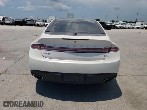 2016 Lincoln MKZ z VIN 3LN6L2GK0GR615898, wystawiony jako Copart lot #62814285 z przebiegiem 231 270 mil mil oraz Szkoda całkowita • Salvage title. Historia ofert i sprzedaży dostępna na DreamBid. Obrazek 6.