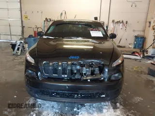 2015 Jeep Cherokee Sport with VIN 1C4PJMAB6FW773953, listed as a IAAI auction lot 41565879 with 242,580 mi miles. Bid and sale history available at carsss.com. Image 12.