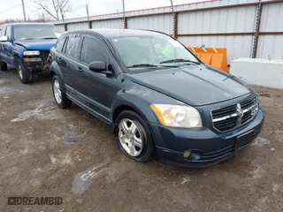 2007 Dodge Caliber SXT with VIN 1B3HB48B77D330653, listed as a IAAI auction lot 41527364 with 218,823 mi miles. Bid and sale history available at carsss.com. Image 1.