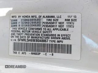 2014 Honda Odyssey EX-L with VIN 5FNRL5H69EB048867, listed as a IAAI auction lot 42190464 with 172,487 mi miles and . Bid and sale history available at carsss.com. Image 9.