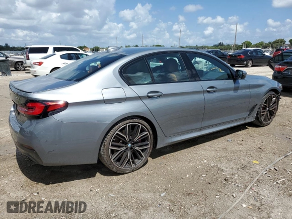 2023 BMW 5 Series 530i with VIN WBA53BH02PCM55841, listed as a Copart auction lot 58391765 with 6,947 mi miles and Salvage title. Bid and sale history available at DreamBid. Image 3.