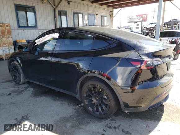 2021 Tesla Model Y Long Range z VIN 5YJYGDEEXMF207223, wystawiony jako Copart lot #48800445 z przebiegiem 44 508 mil mil oraz Szkoda całkowita • Salvage title. Historia ofert i sprzedaży dostępna na DreamBid. Obrazek 2.