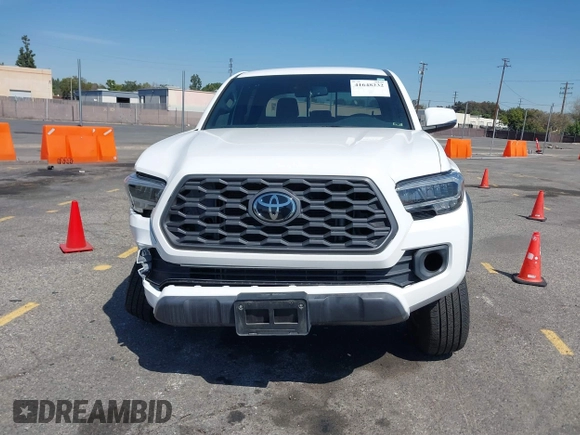 2023 Toyota Tacoma SR5 z VIN 3TMDZ5BN5PM148049, wystawiony jako IAAI lot #41648232 z przebiegiem 22 570 mil mil oraz . Historia ofert i sprzedaży dostępna na DreamBid. Obrazek 12.
