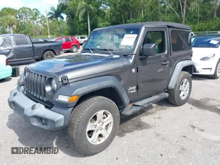 2018 Jeep Wrangler Sport with VIN 1C4GJXAG5JW138437, listed as a IAAI auction lot 42694278 with 58,258 mi miles and . Bid and sale history available at DreamBid. Image 2.