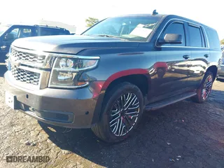 2017 Chevrolet Tahoe Commercial with VIN 1GNLCDEC1HR316004, listed as a IAAI auction lot 40868605 with 234,956 mi miles. Bid and sale history available at carsss.com. Image 18.