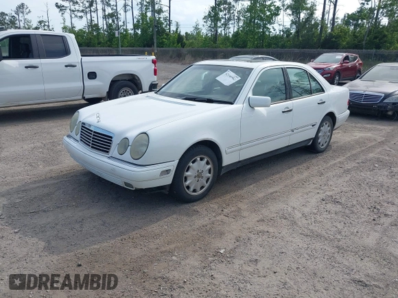 1998 Mercedes-Benz E-Class with VIN WDBJF65FXWA615255, listed as a IAAI auction lot 42146962 with 219,710 mi miles. Bid and sale history available at carsss.com. Image 2.