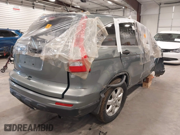 2011 Honda CR-V SE with VIN JHLRE4H42BC006698, listed as a IAAI auction lot 41099185 with 99,352 mi miles. Bid and sale history available at carsss.com. Image 4.
