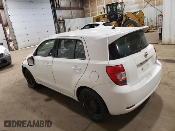 2014 Scion xD with VIN JTKKUPB48E1046627, listed as a Copart auction lot 61498995 with 63,452 mi miles and Salvage title. Bid and sale history available at DreamBid. Image 2.