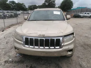 2012 Jeep Grand Cherokee Laredo with VIN 1C4RJEAGXCC157616, listed as a IAAI auction lot 42156539 with 301,661 mi miles. Bid and sale history available at carsss.com. Image 12.